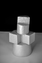 A stack of cubes sitting on top of a table