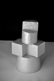 A stack of cubes sitting on top of a table