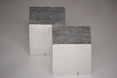 Three blocks of concrete sitting side by side