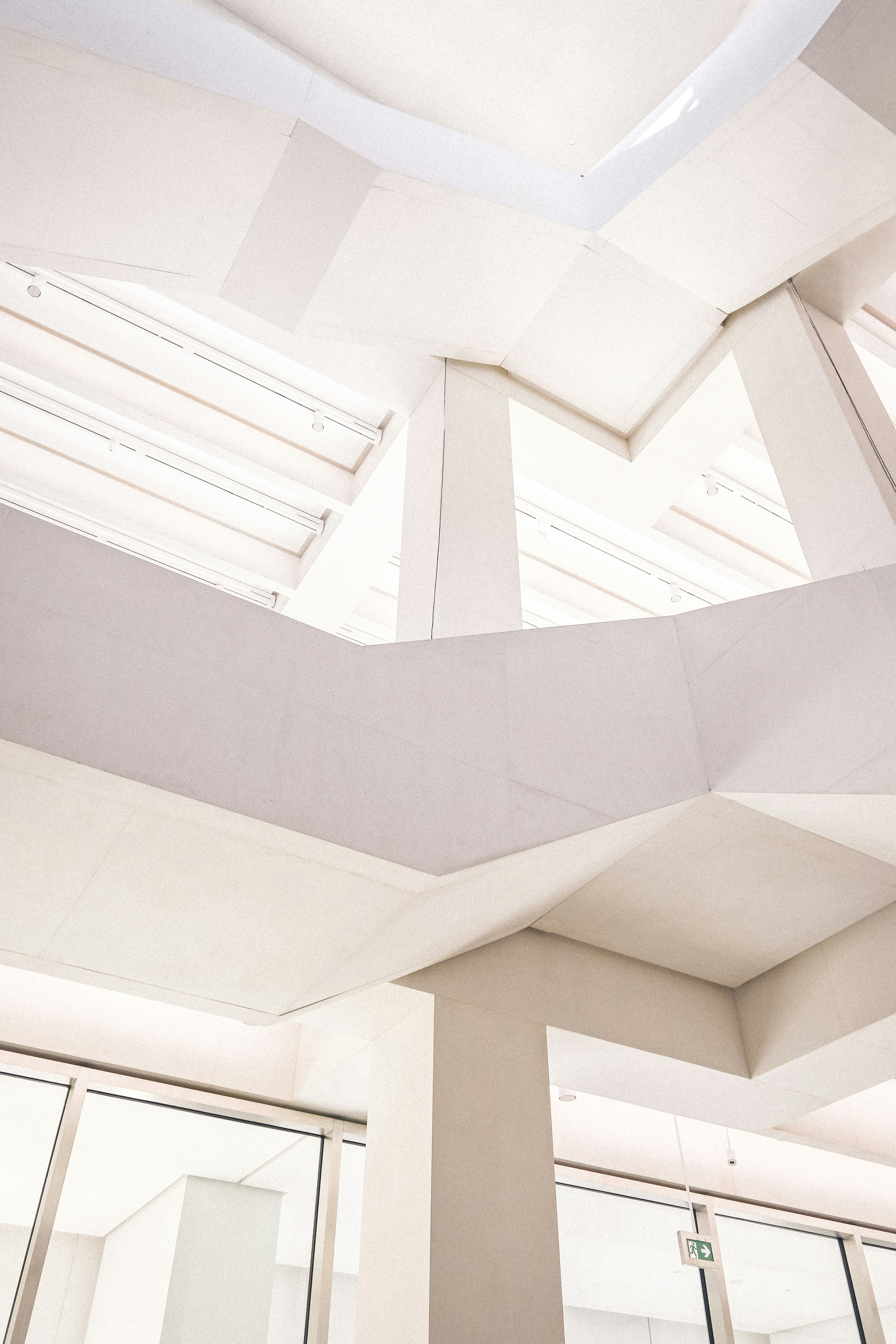 A white room with a skylight and windows