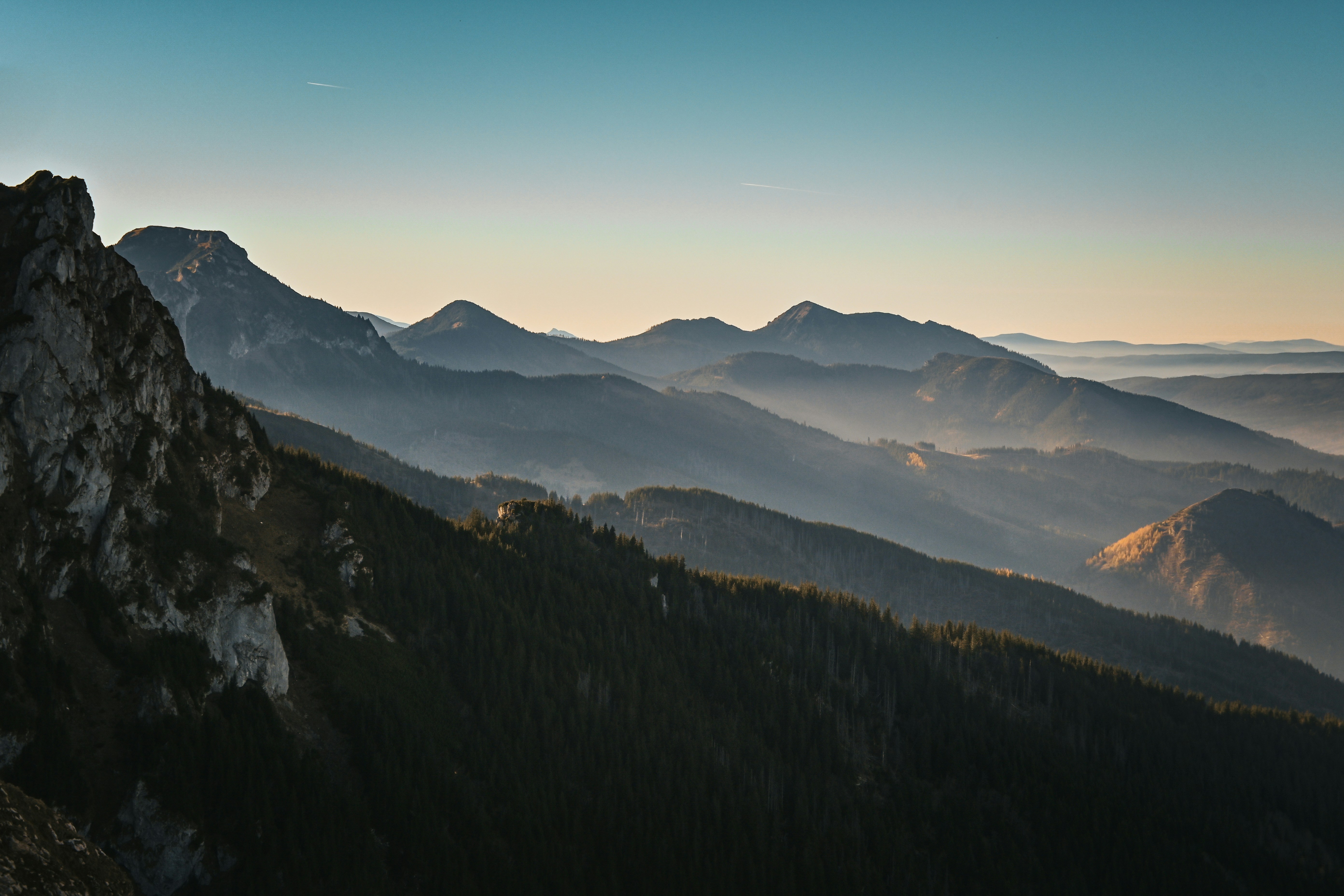 A person standing on top of a mountain