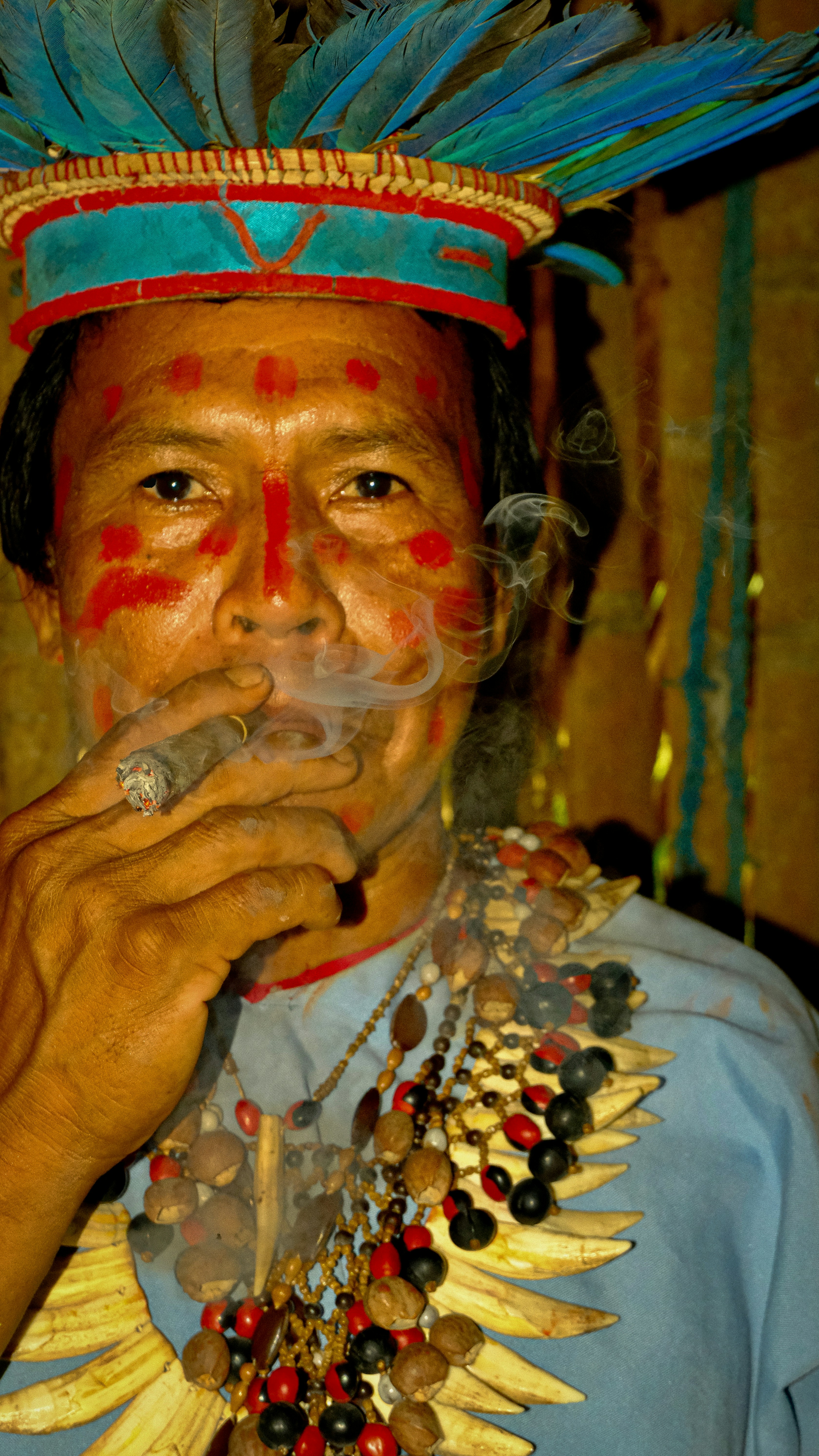 A native american man smoking a cigarette