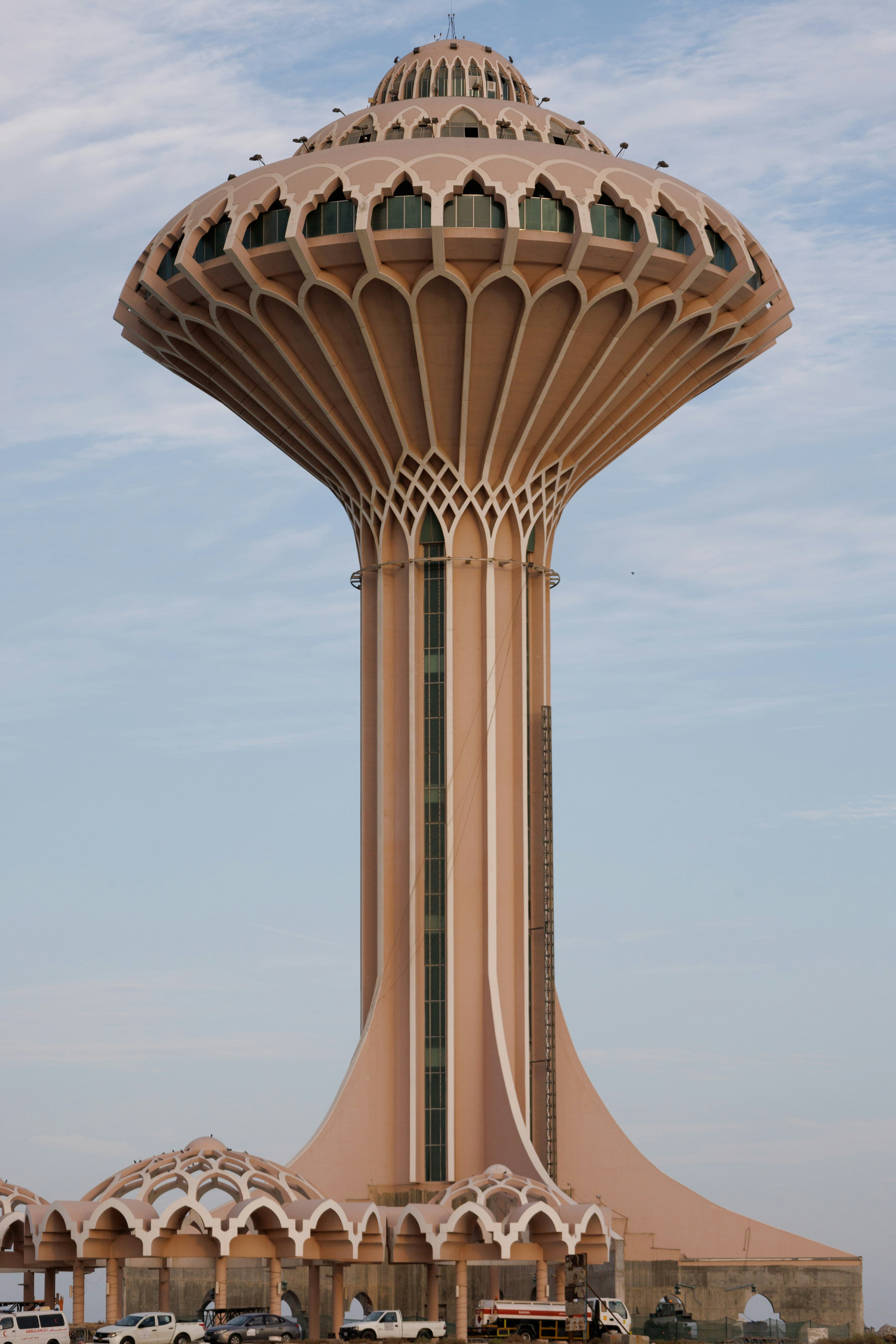 A large building with a very tall tower on top of it