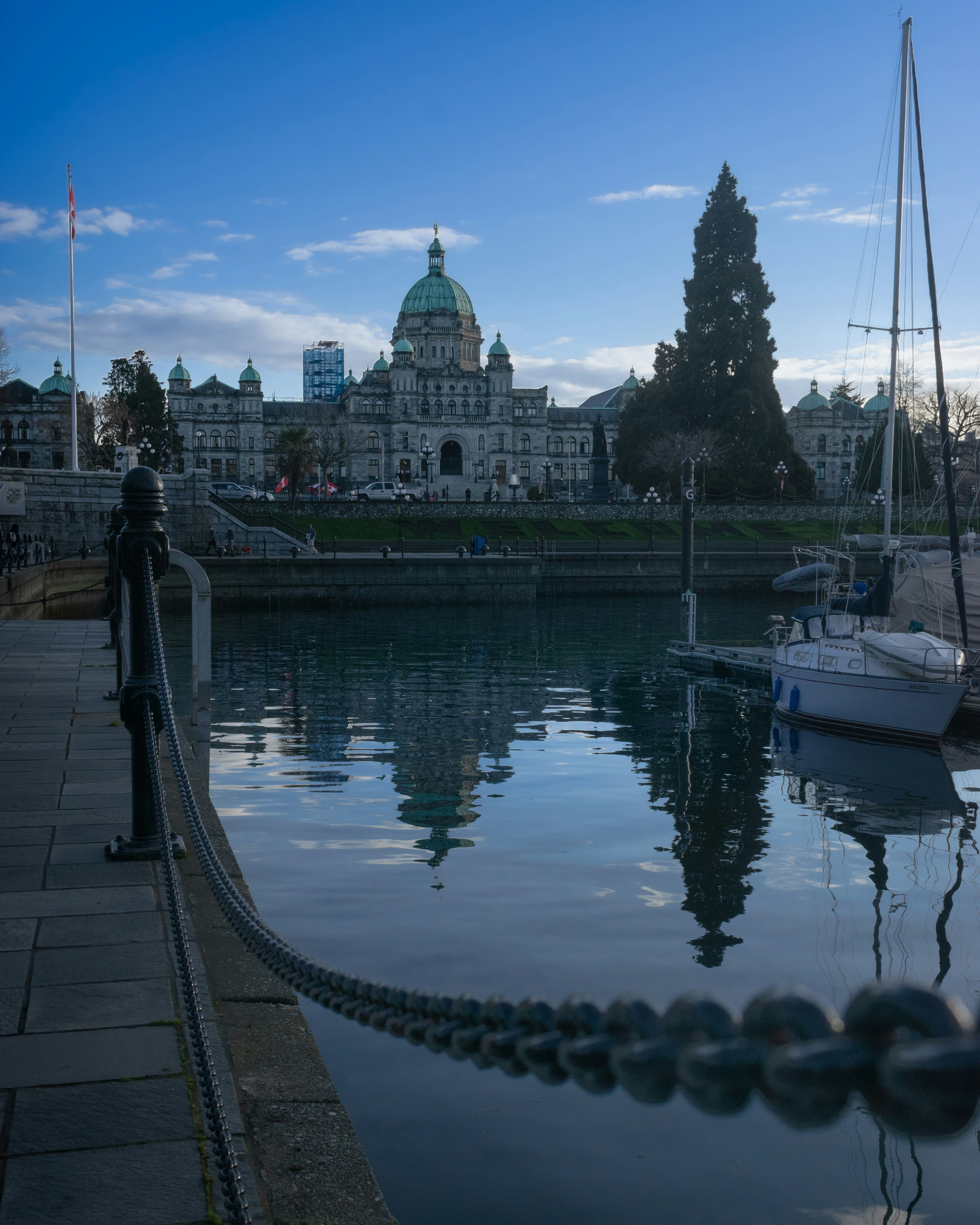 A body of water with a bunch of boats in it