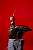 A pair of jeans and a can of soda