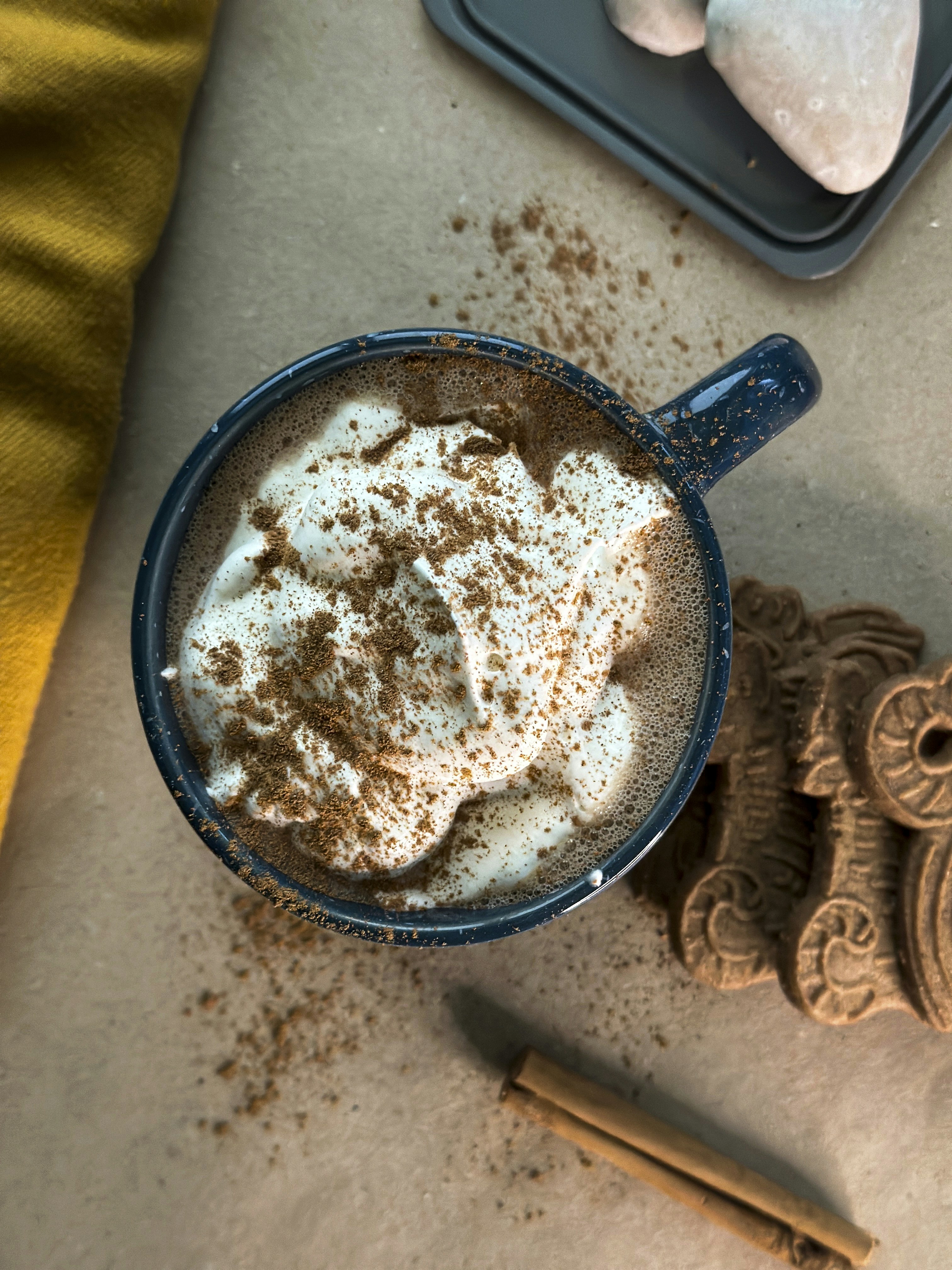 A cup of hot chocolate with whipped cream
