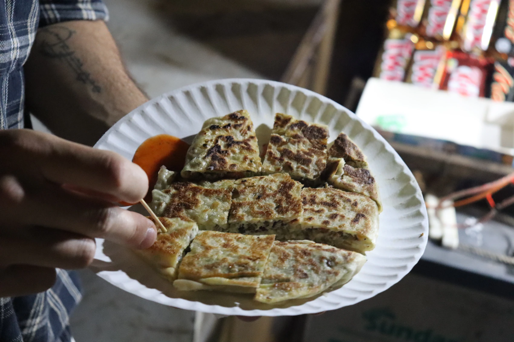 A plate of food being served at Forodhani Gardens in Stone Town