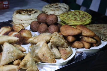 A table topped with lots of different types of pastries