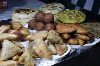 A table topped with lots of different types of pastries
