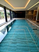 A large indoor swimming pool in a house