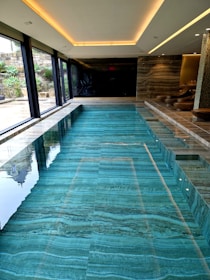 A large indoor swimming pool in a house