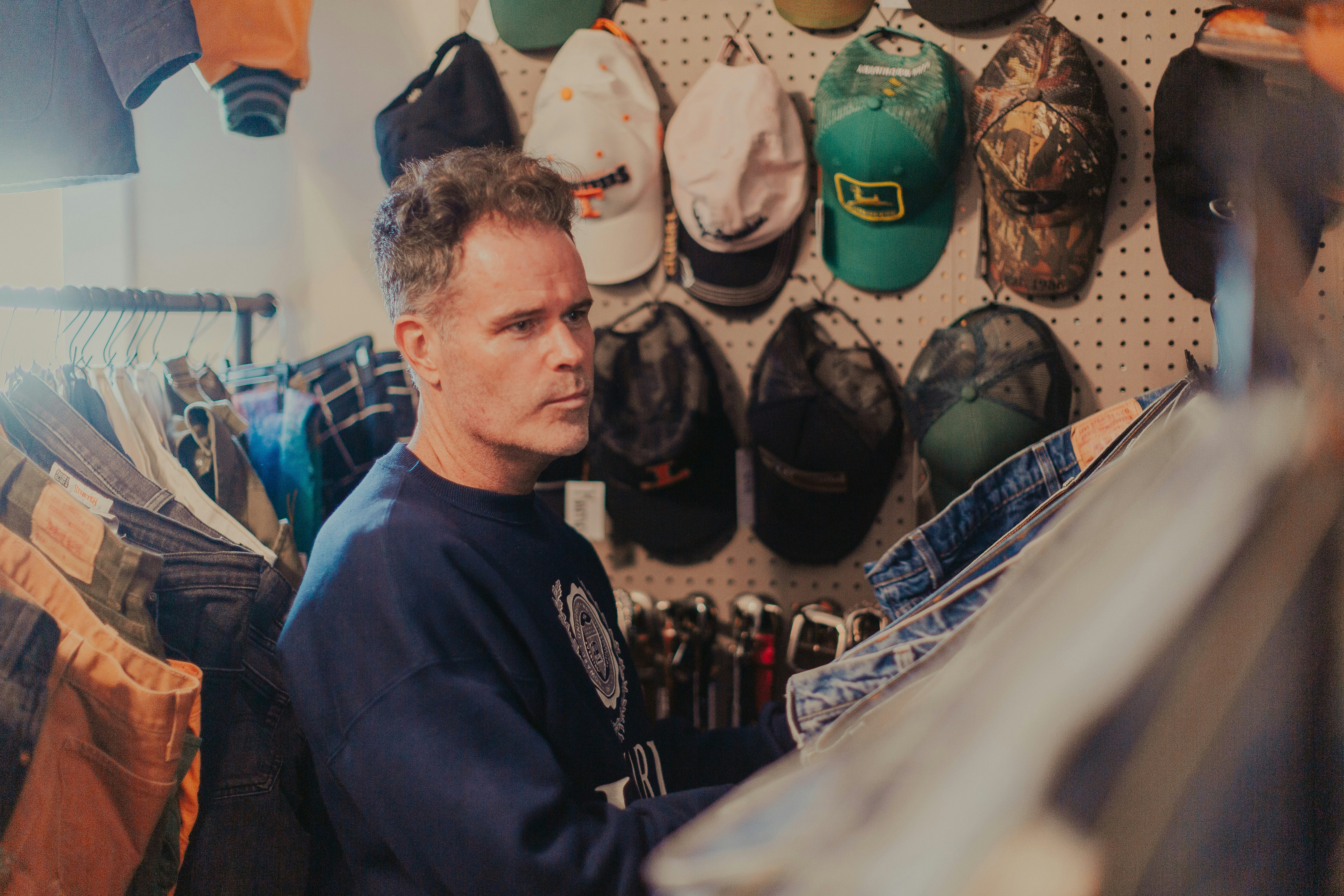 Service advisor at an auto repair shop reviewing an estimate with a driver
