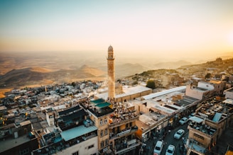 A view of a city with a tall clock tower