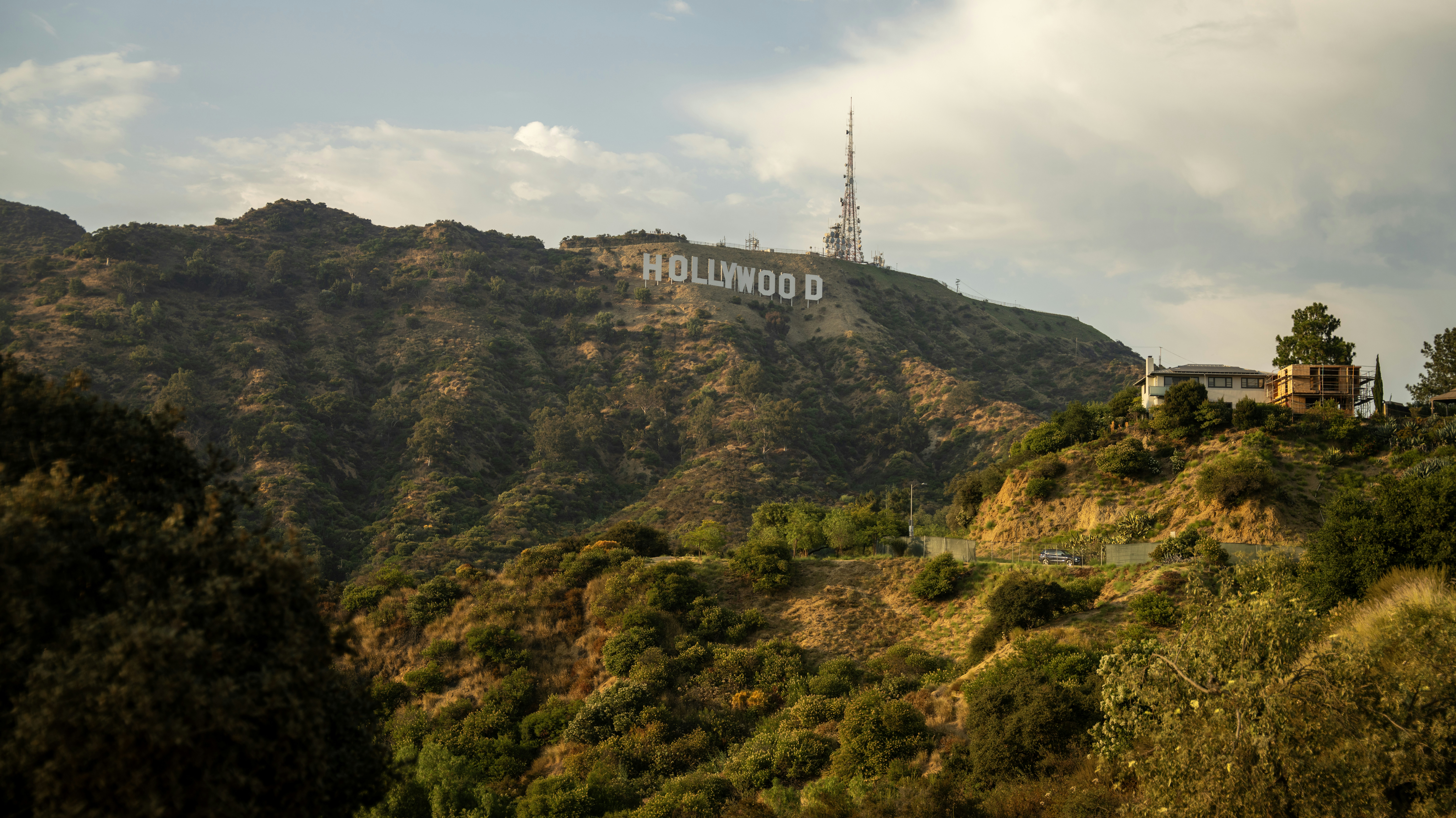 A hill with a sign on top of it