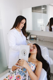 A woman getting her hair done in a salon