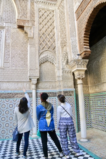 A group of women standing next to each other