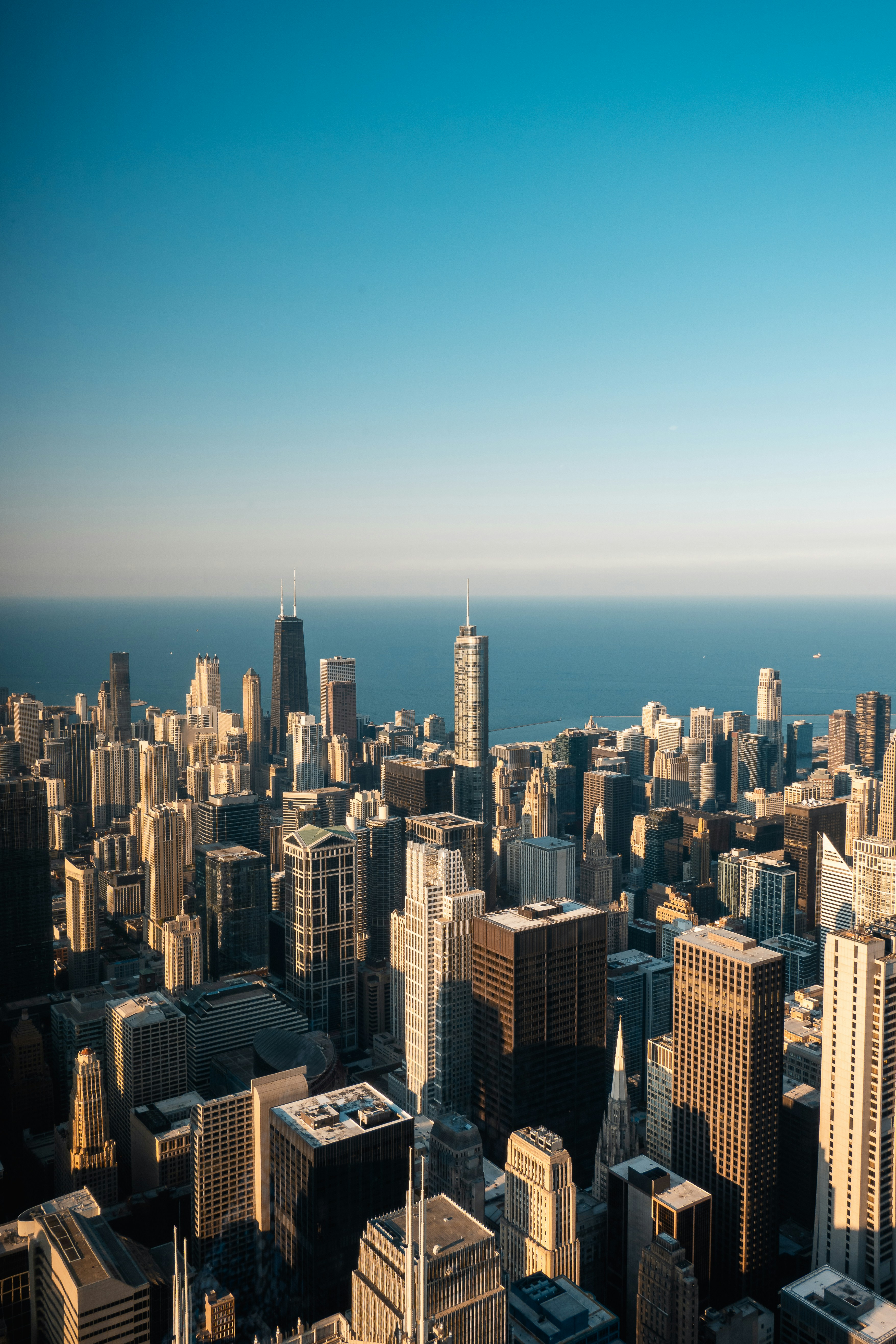 An aerial view of a city with tall buildings
