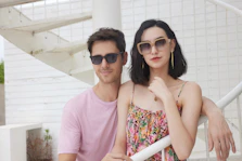 A man and a woman standing next to each other