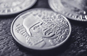 A close up of a coin on a table