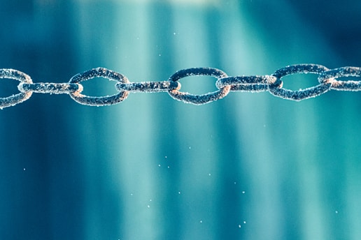 A chain is shown in the middle of the picture
