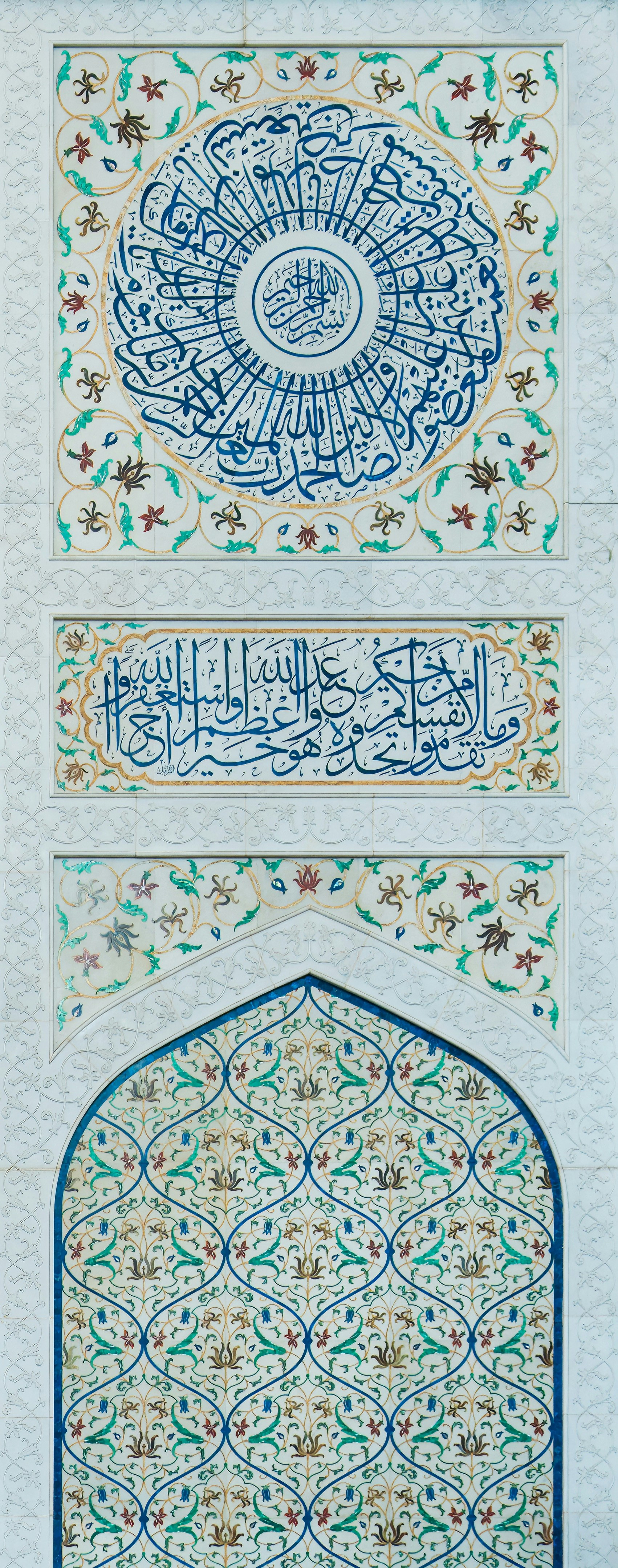 An intricately decorated wall in a building