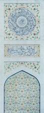 An intricately decorated wall in a building