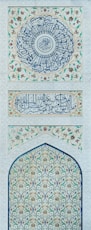 An intricately decorated wall in a building