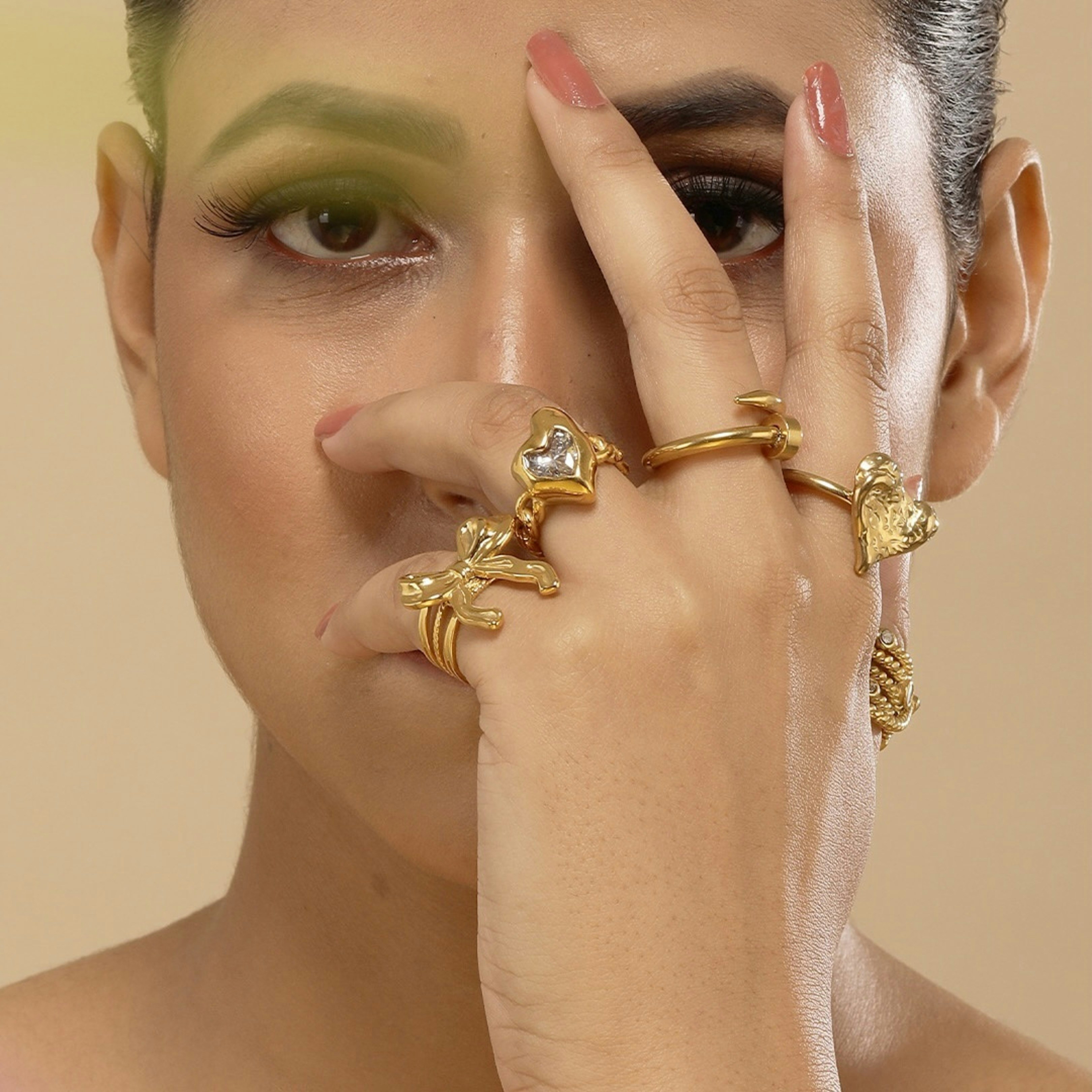 A woman with a ring on her left hand and a ring on her right hand