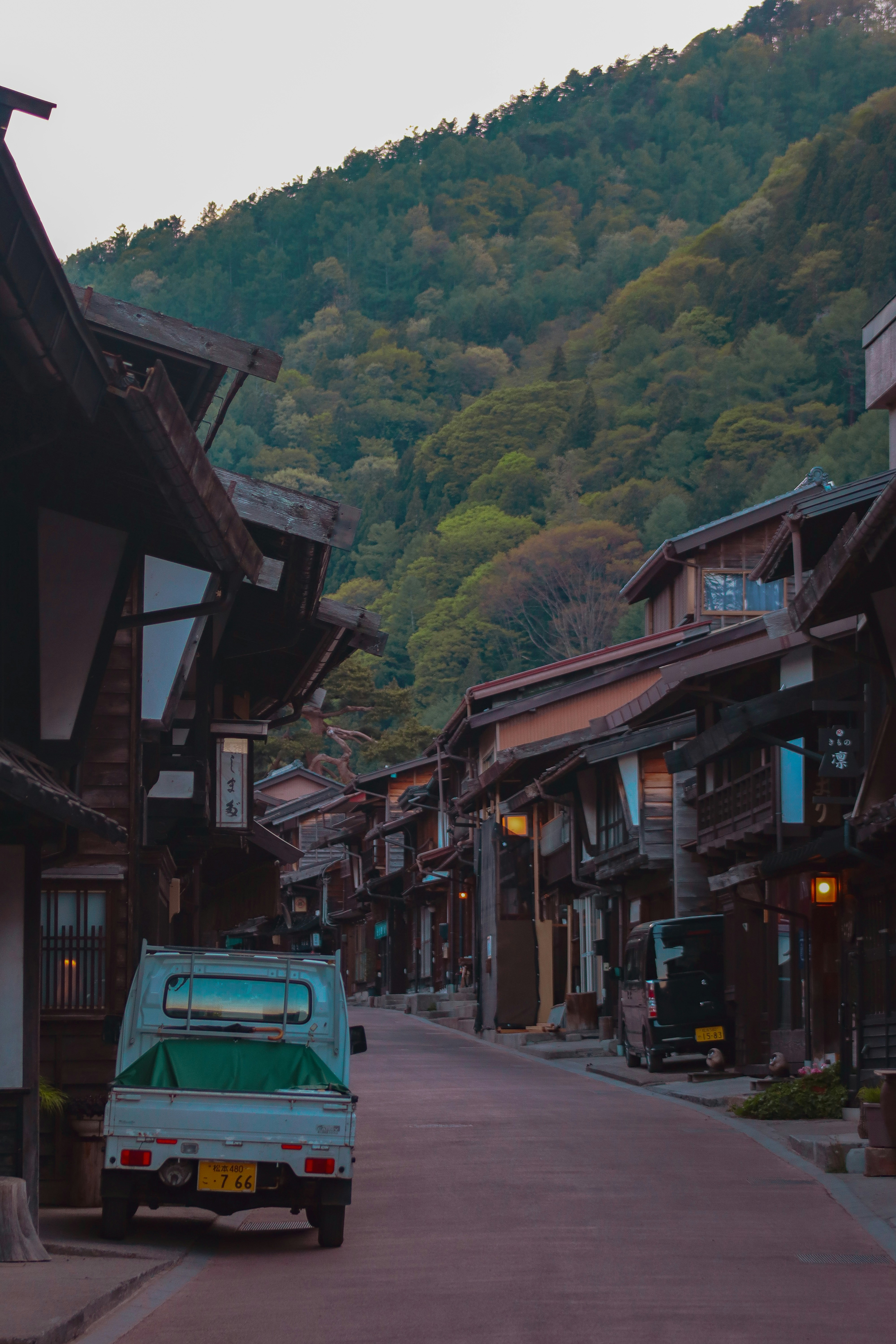 A van parked on the side of a street