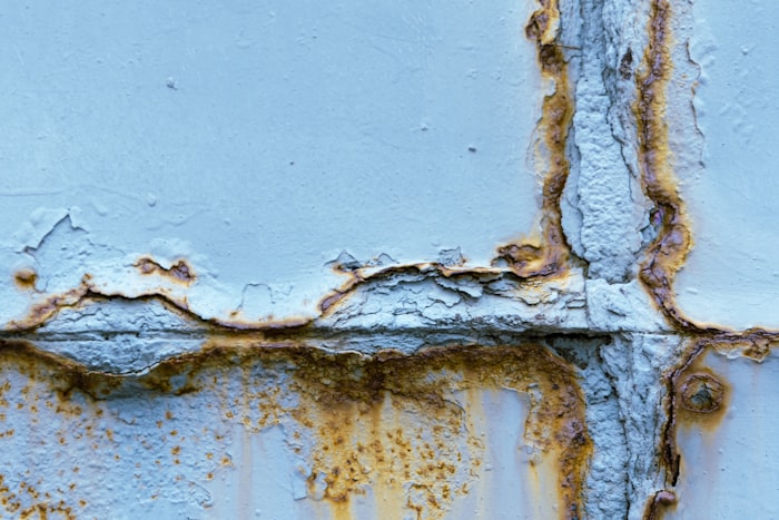 Rusted and painted steel surface