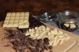 A cutting board topped with lots of food
