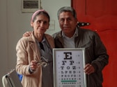 A man and a woman standing next to each other