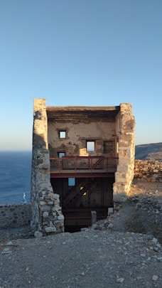 An old building with a balcony on top of it