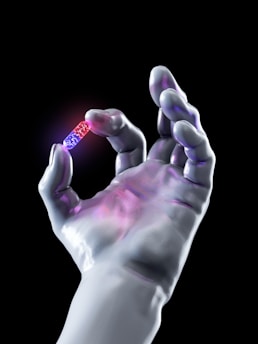 A hand holding a toothbrush in it's palm