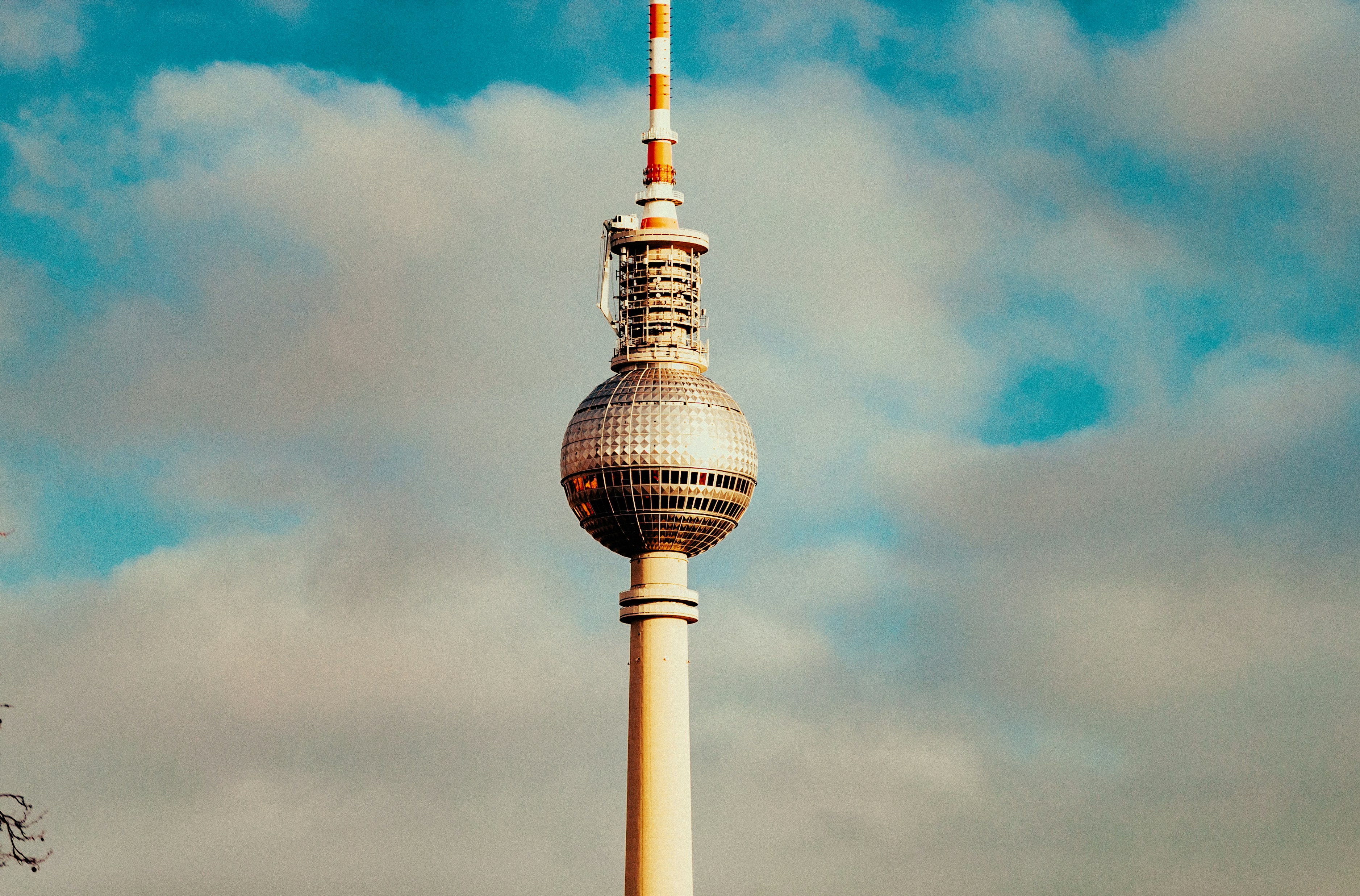 A tall tower with a sky background