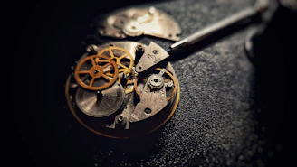A close up of a pocket watch on a table