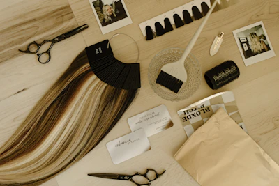 A table topped with a pair of scissors and a pair of scissors