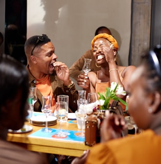 A group of people sitting around a table