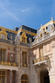 A large building with a clock on the front of it