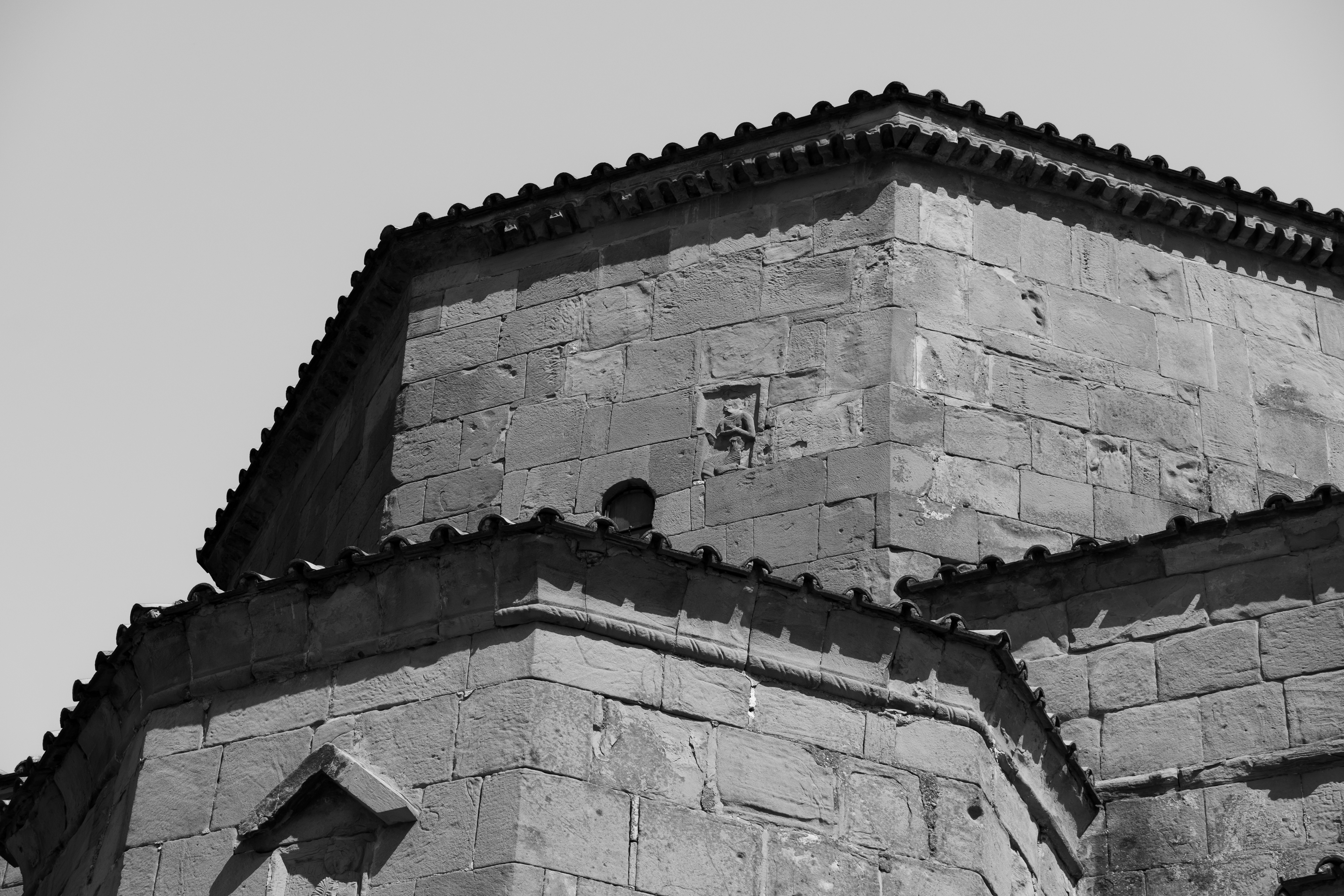 A black and white photo of a clock tower