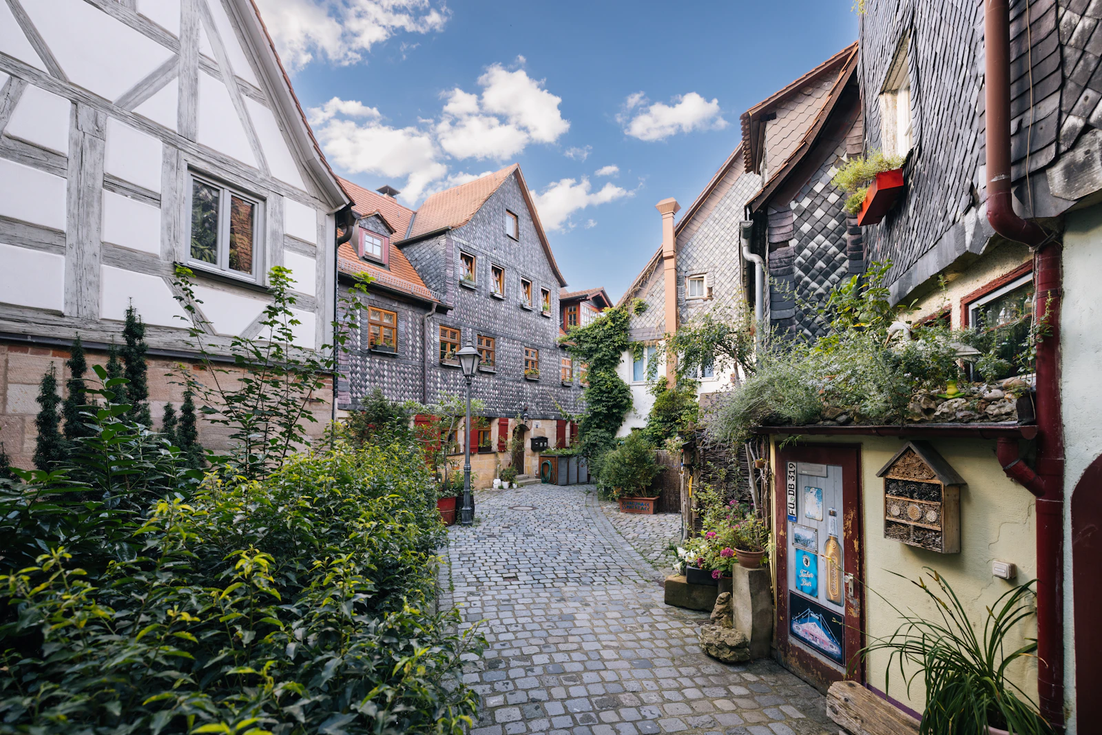 A narrow cobblestone street in a village on Germany's Romantic Road