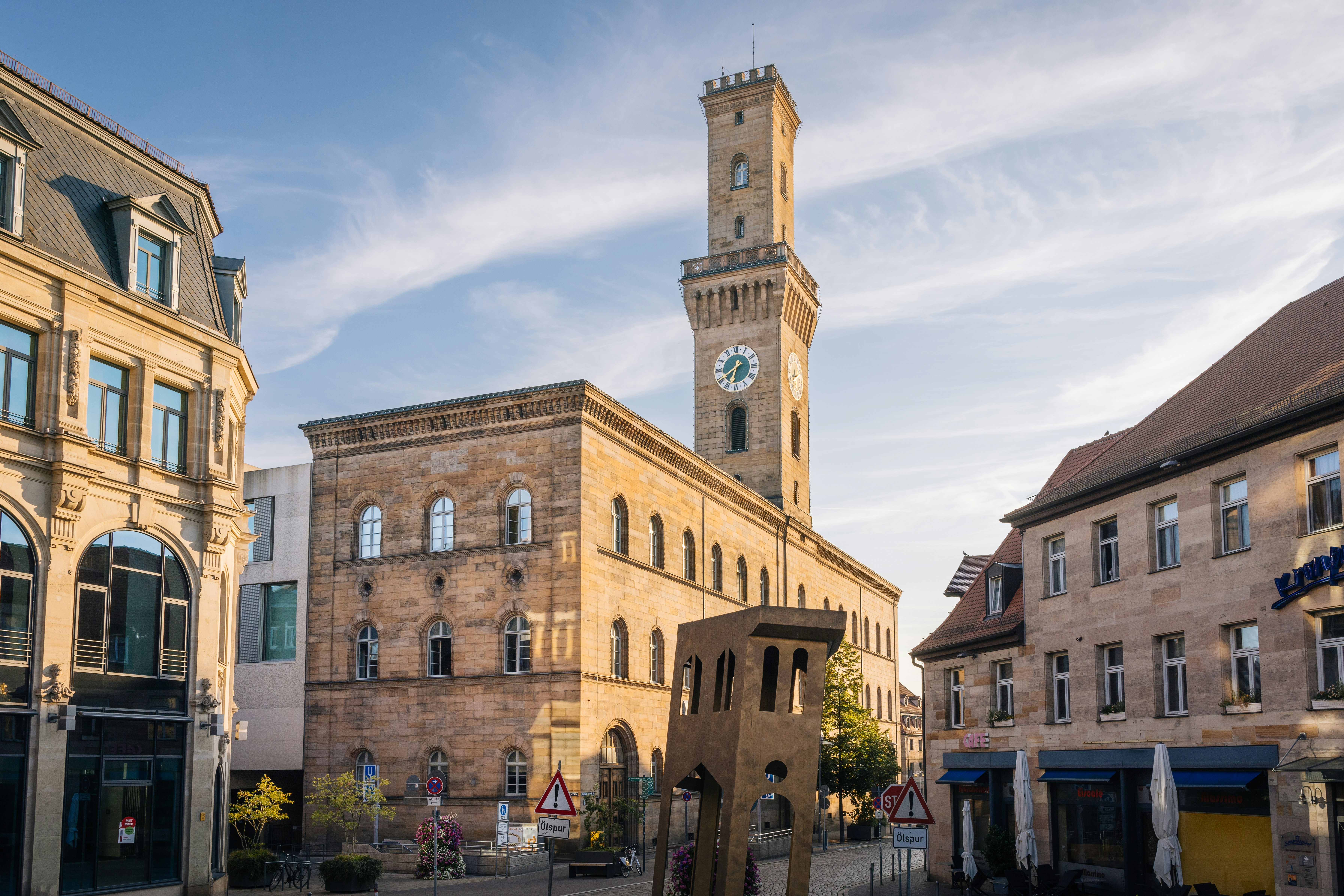 A large clock tower towering over a city