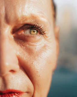 A close up of a woman's face and eyes