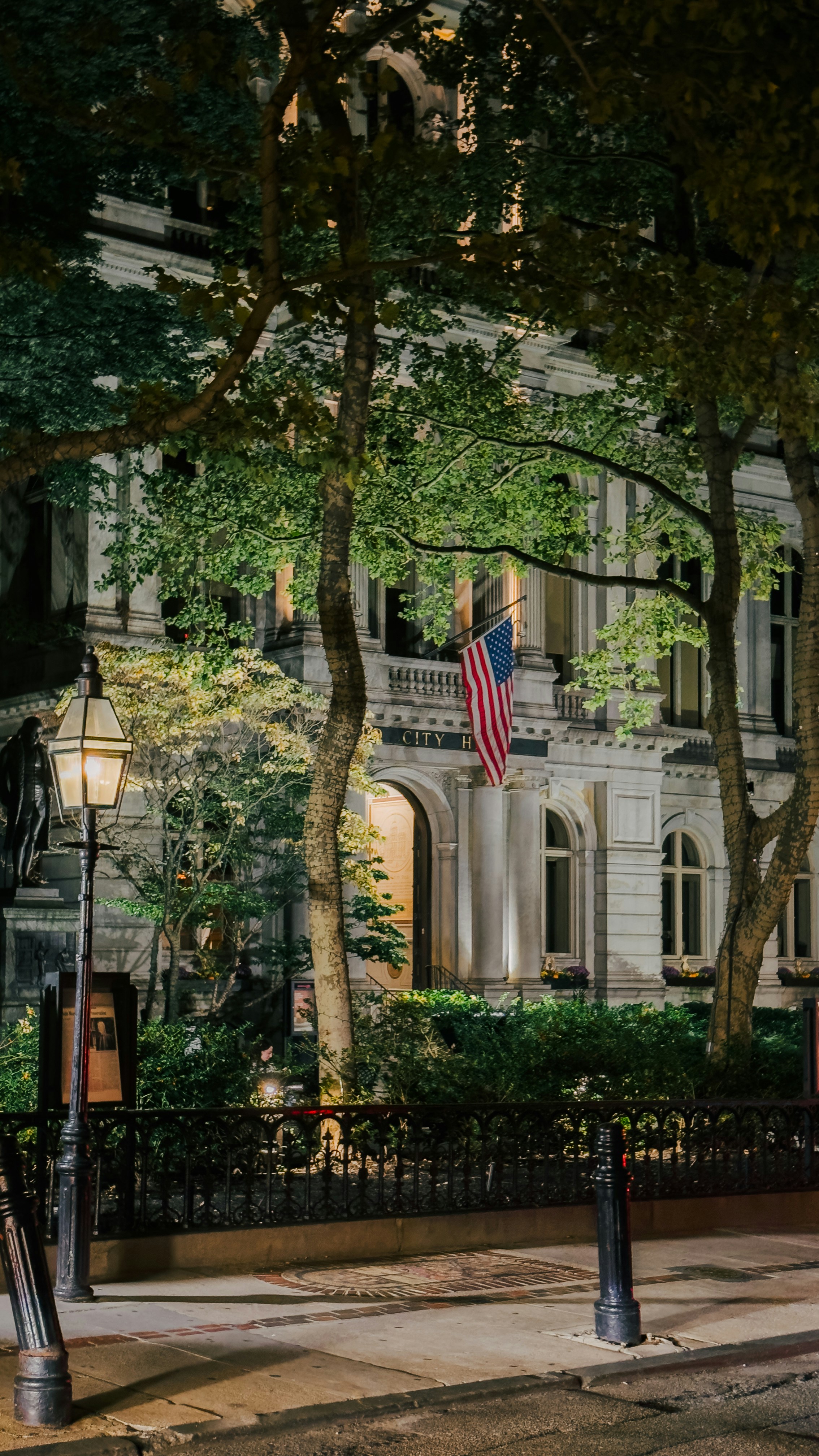 A street scene with focus on a building at night