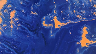 A close up of a blue and yellow painting