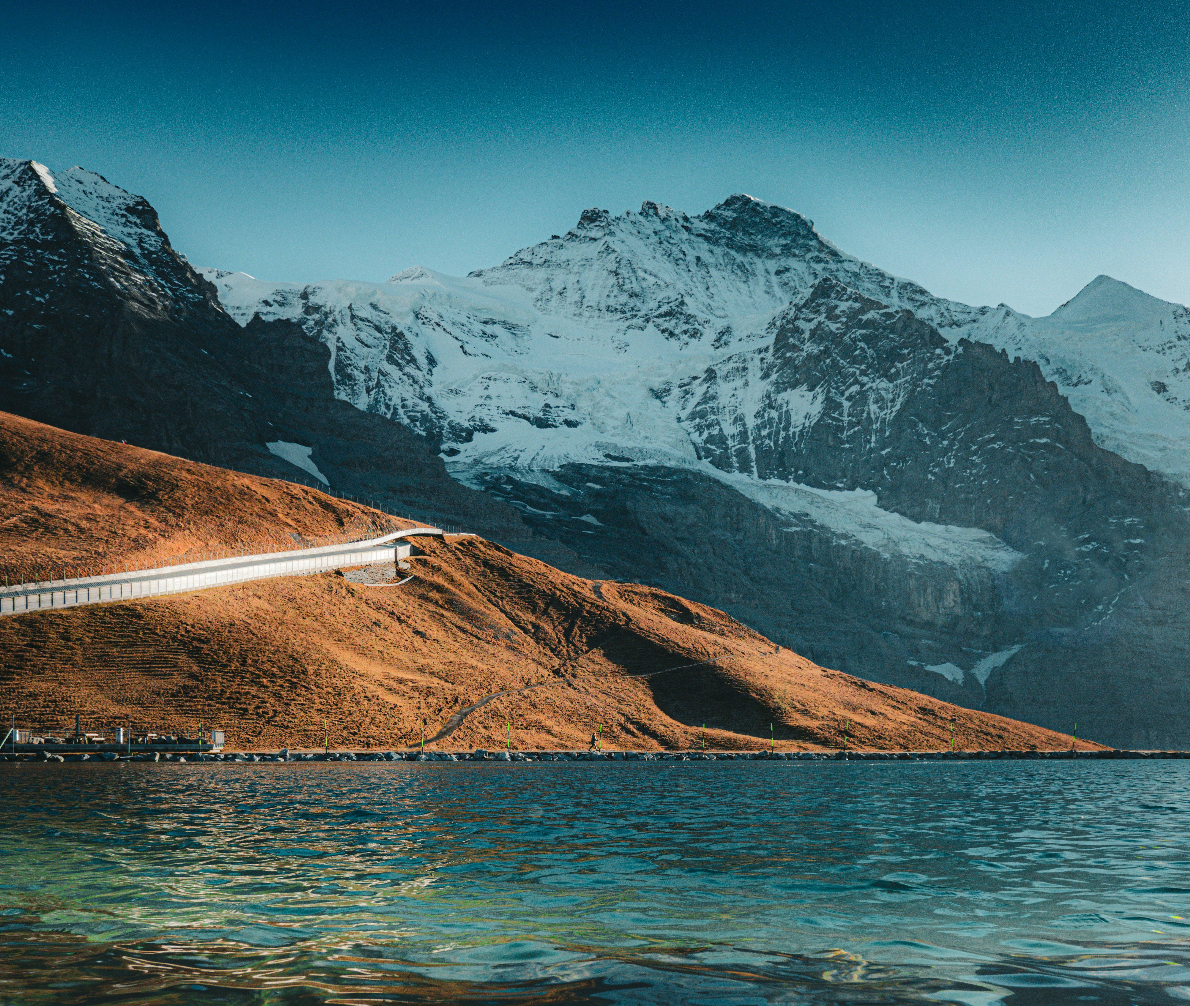 A scenic view of mountains and a body of water