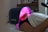 A woman laying on a bed with her head on a pillow