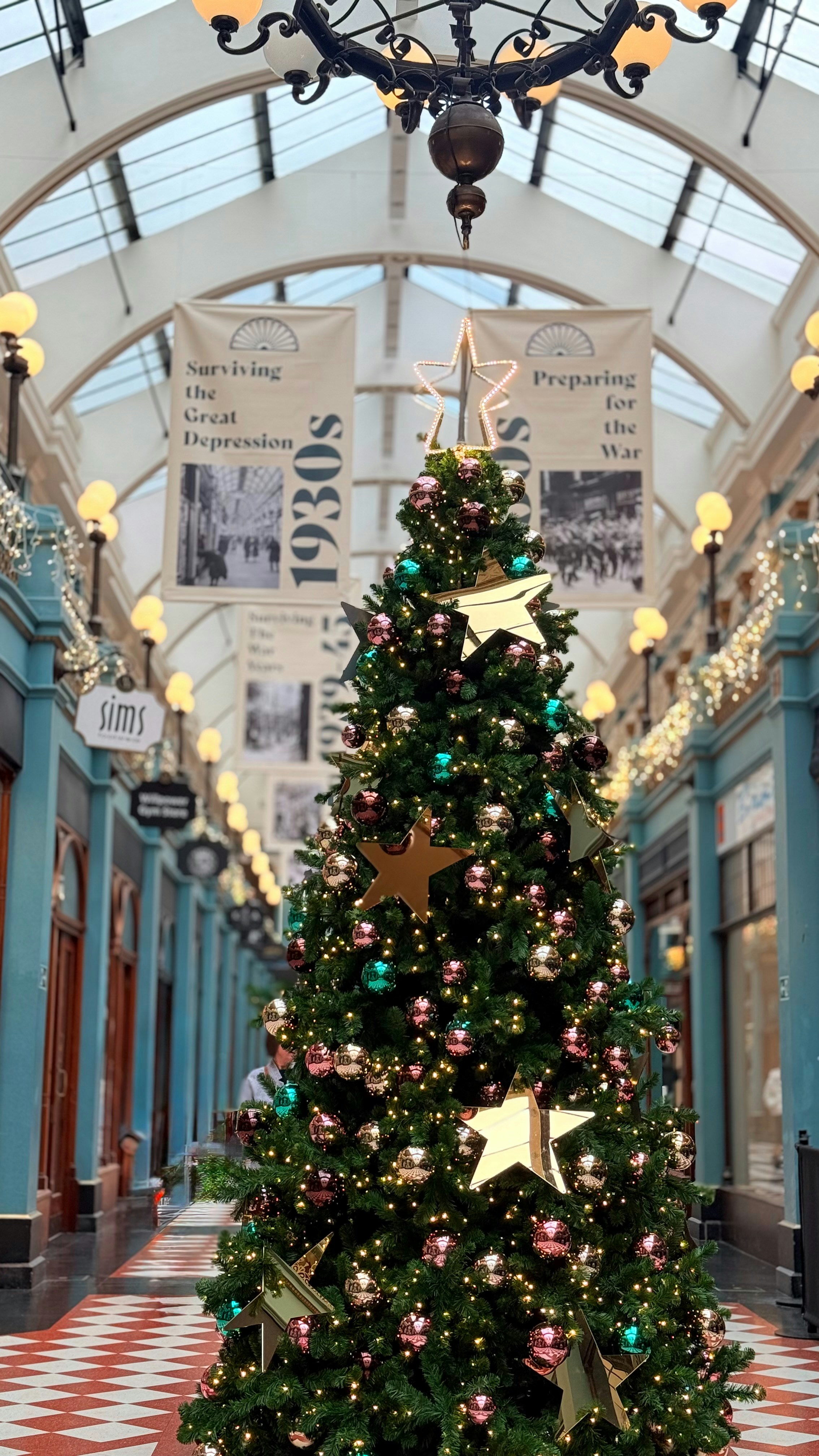 A decorated christmas tree in a shopping mall