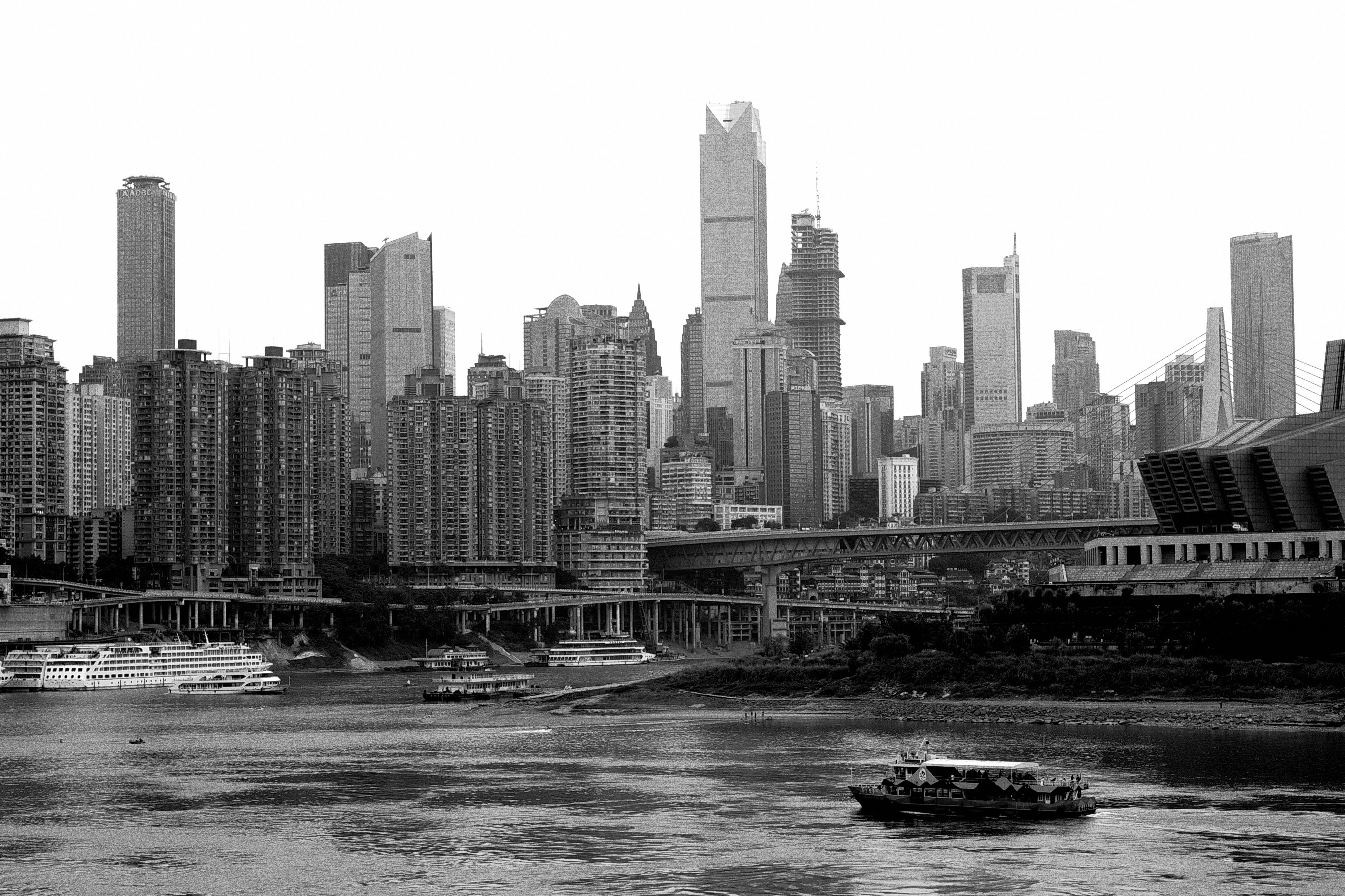 A black and white photo of a city skyline