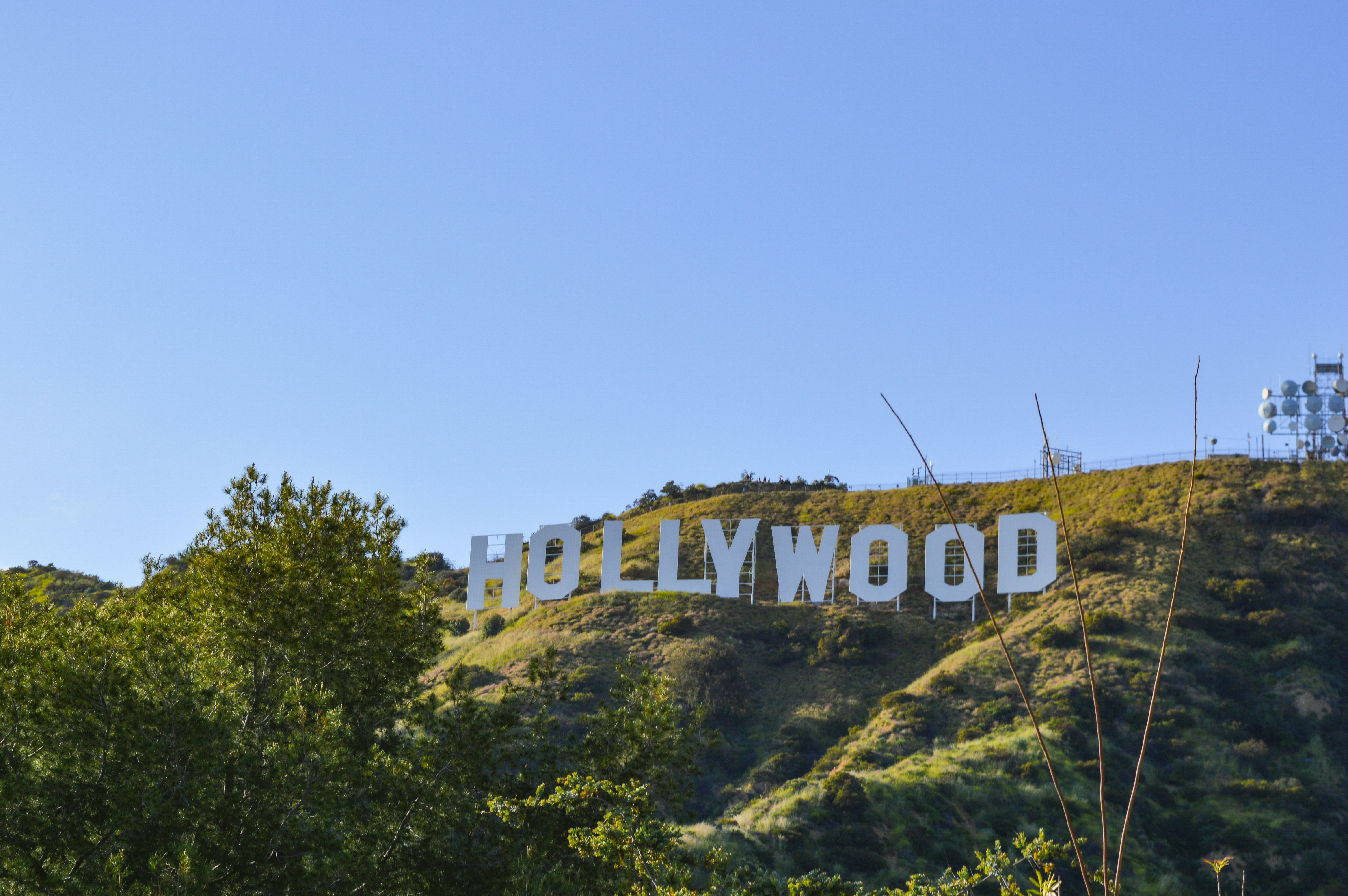 A hollywood sign on top of a hill